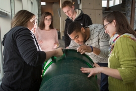 Green Advisors sort through a campus trash bin.